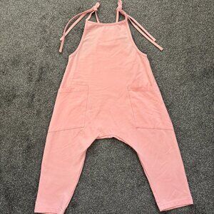 Remie Girl light pink drop crotch jumpsuit, 2 front pockets, ties at shoulders